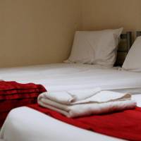 Single Bed in Dormitory Room