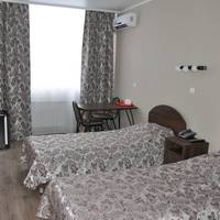 Двухместный с 1 кроватью или 2 отдельными кроватями