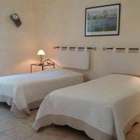 Family Two Bedroom Suite with kitchenette and Pool View