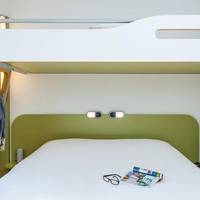 Room with One Queen Bed and One Bunk Bed