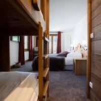 Two Connecting Family Rooms with Balcony and Lake View