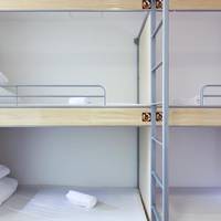 Bed in 4-Bed Dormitory Room with Private Bathroom