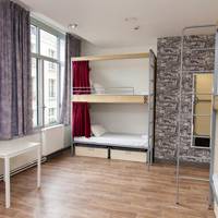 Bed in 8-Bed Dormitory Room with Private Bathroom