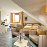 Quadruple Room (2 Adults + 2 Children)