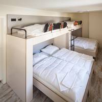 Single Bed in Dormitory Room