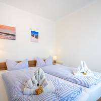 Double Room with small living room (2 Adults + 1 Child)