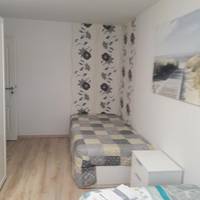 Twin Room with Shared Bathroom first level
