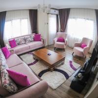 Three-Bedroom Apartment with Balcony and Sea View