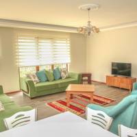 Three-Bedroom Apartment with Balcony and Sea View