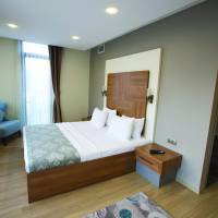 Two-Bedroom Apartment with Balcony and City View 