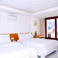 Deluxe Family Room with Balcony and Partial Sea View