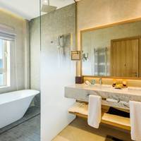 Deluxe Suite with Partial Sea View