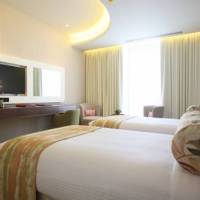DELUXE ROOM  Partial Sea View, King Bed or Two Single Beds