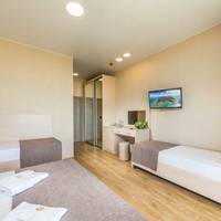 Standard Quadruple Room with Partial Sea View