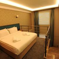 Duplex Suite with 1 Queen Size Bed and Sofa