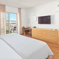 Two-Bedroom Suite with Balcony and Sea View