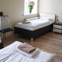 Quadruple Room with four single beds