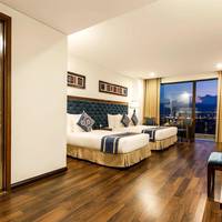 Triple Room with Balcony and City View