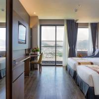 Deluxe Triple Room with Balcony - City and Mountain View