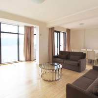 Three-Bedroom Apartment with Balcony and Sea View