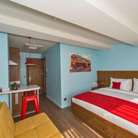Deluxe Suite with Balcony & Kitchenette