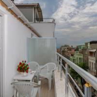 Deluxe Triple Room with Balcony and Sea View