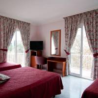 Quadruple Room (2 Adults + 2 Children)