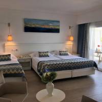 Junior Suite (2 Adults + 1 Child) with Balcony
