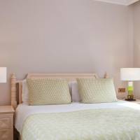 One-Bedroom Family Room - Golf and Sea View (2 Adults + 2 Children)