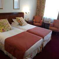 Superior Twin Room with Balcony and Side Sea View