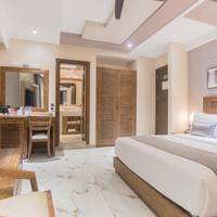 Executive Suite with Balcony including Free return Airport Transfer 
