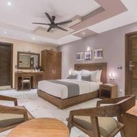 Samann Suite with Balcony including Free return Airport Transfer 