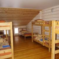 Family room with bunk beds in a hostel-style with shared bathroom
