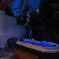 Deluxe Room with Outdoor Jetted Tub and Garden View