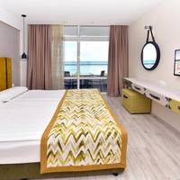 Family Room with Sea View (3 Adults + 1 Child) – Free Infinity Pool and Private Beach Access 