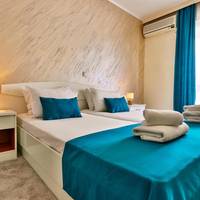 Junior Suite with Balcony and Pool View