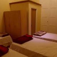 Quadruple Room with Shared Bathroom