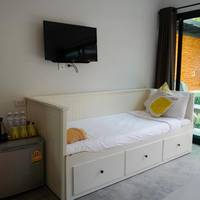 Double Room + sofa bed with Garden View (for 3 Adult)