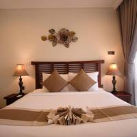Junior Suite with Garden and River View
