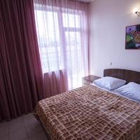Двухместный с 1 кроватью или 2 отдельными кроватями