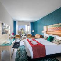 Junior Suite with Side Sea View (2 Adults + 2 Children)