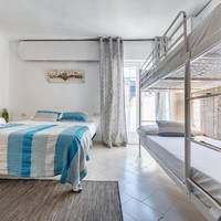 Quadruple Room with Private Bathroom