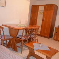 One-Bedroom Apartment (2 Adults + 2 Children)