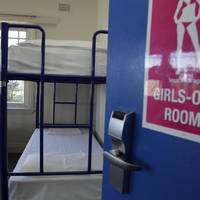 Bed in 4-Bed Female Dormitory Room with Shared Bathroom