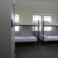 Bed in 6-Bed Female Dormitory Room with Shared Bathroom