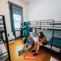 Bed in 4-Bed Female Dormitory Room with Shared Bathroom