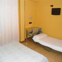 Habitación Doble con cama supletoria (2 adultos + 1 niño)