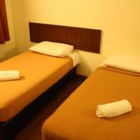 Single Bed in Dormitory Room
