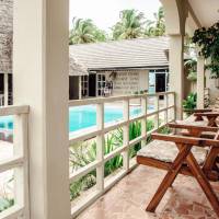 One-Bedroom Apartment with Pool and Sea View