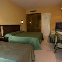 Quadruple Room (2 Adults + 2 Children)